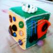 Вязаная игрушка Развивающий кубик Вязаная игрушка Развивающий кубик